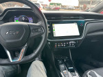 Interior view of a 2023 Chevrolet Bolt 2LT showcasing the dashboard and touchscreen navigation.