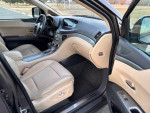 Interior view of a 2008 Subaru Tribeca with leather seats and modern dashboard design.