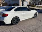 2015 BMW m235i coupe in excellent condition, featuring a turbocharged engine and custom exhaust.