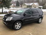2011 GMC Acadia in black with towing package and heated front seats for sale, very clean and well-maintained.