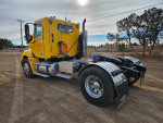 2008 Freightliner Columbia CL120 truck with a rebuilt engine, new transmission, and fresh tires parked outdoors.