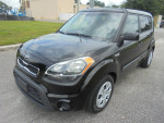 2013 Kia Soul Sport SUV in black, clean exterior, Bluetooth audio, ready for confident driving.