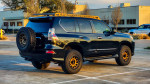 2016 Lexus GX 460 4WD parked, equipped for off-road adventures with custom modifications and rugged tires.