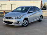 2015 Hyundai Accent GLS for sale in Lubbock, clean interior, cold AC, good tires, reliable with 144,000 miles.