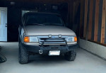 1993 Ford Ranger STX 4x4 in garage, features rebuilt 4.0 V6 engine and manual 5-speed transmission.