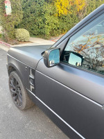 2006 Land Rover Range Rover exterior close-up, showing matte finish and modern design features.