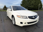 2007 Acura TSX in white with low mileage, featuring keyless entry and leather heated seats.