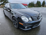 2008 E63 AMG in mint condition, featuring a performance package and stylish black exterior.