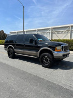 2001 Ford Excursion Limited 7.3 Diesel, black with tan interior, 62,000 miles, 6-inch lift, well-maintained SUV.