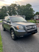 2007 Honda Pilot EX-L 4WD, gray SUV with a clean exterior, perfecting for everyday driving.