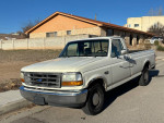 1992 Ford F-150 truck with 92,000 miles, clean exterior, long bed, and powerful V6 engine, available for sale.