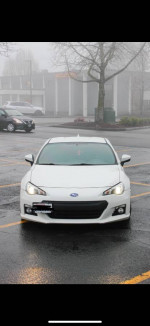 2015 Subaru BRZ in near mint condition with modifications, parked in a misty outdoor setting.