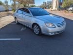 2006 Toyota Avalon XLS FWD in silver, featuring leather interior, sunroof, and clean exterior.