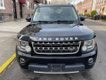 Front view of a 2014 Land Rover LR4 HSE 4WD, showcasing its sleek design and distinctive grille.