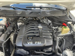 2012 Volkswagen Touareg V6 engine viewed from above, showcasing full maintenance and performance features.