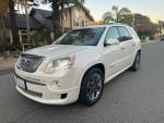 White 2011 GMC Acadia Denali FWD parked on the street, with 135K miles and in excellent condition.