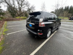 2019 Lexus GX 460 parked in a clean, well-maintained lot showcasing its sleek black exterior.