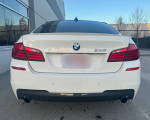 2011 BMW 535xi M-sport Sedan in Alpine white with sleek design and advanced features