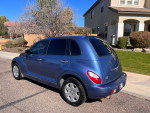 2006 Chrysler PT Cruiser Touring in blue parked outside, featuring low mileage and clean title.