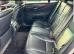 Interior view of a 2008 Lexus LS 460 showing back leather seats and spacious cabin design.