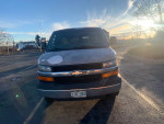 Front view of a 2006 Chevrolet Express 3500 passenger van with a clean title, well maintained, and ready for road trips.