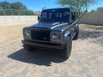 1994 Land Rover Defender 110 in excellent condition, showcasing modified features and low mileage of 60,000 miles.
