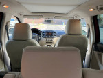 Interior view of a 2014 Volkswagen Tiguan SEL with leather seats and dashboard features