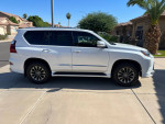 2019 Lexus GX 460 4WD parked in residential area, featuring luxury design and premium options.