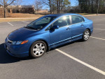 2006 Honda Civic blue sedan with 105,000 miles, automatic transmission, and well-maintained interior