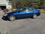 2003 Honda Accord in blue, 76,000 miles, parked on driveway with minor rust and paint issues.