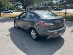 2010 Mazda 3 in excellent condition with clean title and low mileage parked on the street.