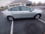 2016 Ford Fusion S FWD sedan in silver with low mileage, featuring keyless entry and Bluetooth capabilities.
