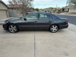 2006 Lexus LS 430 in Flint Pearl parked on driveway, featuring premium package and low mileage.