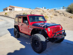 2012 Jeep Wrangler Unlimited Rubicon for sale, lifted with off-road features, excellent condition, ideal for overlanding.