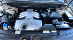 2007 Hyundai Veracruz engine bay showing V6 engine, battery, and various components in clean condition.