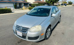 2024 Volkswagen Jetta for sale, silver sedan with leather seats and sunroof, excellent condition, 142,000 miles