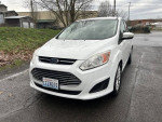 2014 Ford CMax Hybrid in white, showcasing its clean exterior and modern design with low mileage.