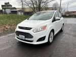 2014 Ford CMax Hybrid with clean title and 120k original miles, showcasing its fuel-efficient design.