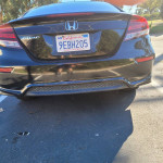 2015 Honda Civic EX FWD with a clean exterior and salvage title, showing the rear view and license plate.