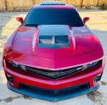 Front view of a 2013 Chevrolet Camaro ZL1, showcasing its sleek design and performance features.