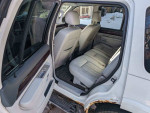 Interior view of a 2004 Lincoln Aviator Luxury SUV featuring grey leather seats and a spacious cabin.