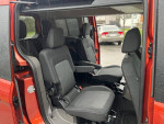 Interior view of 2022 Ford Transit Connect showing spacious passenger seating and modern design features.