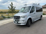 2022 Airstream Interstate 19 RV van in silver, low mileage and like new condition, parked outdoors