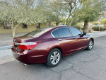 2013 Honda Accord LX sedan in maroon color parked, showcasing clean exterior and tinted windows
