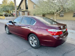 2013 Honda Accord LX Sedan in maroon color parked on the street, showcasing clean exterior and tinted windows.