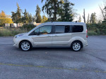 2014 Transit Connect XLT LWB minivan in great condition, displaying power features and room for seven passengers.