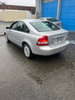 2005 Volvo S40 2.4i sedan in silver color parked, showcasing recent maintenance and low mileage.