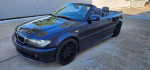 BMW 330i Convertible in blue color with black rims, showcasing clean title and low mileage of 138K miles.