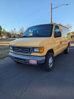 2007 Ford Ecoline cargo van in yellow, reliable work truck in great condition, ready for new owner.