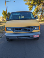 Front view of a 2007 Ford Ecoline cargo van, ideal for work, in good condition with clear exterior features.